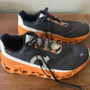 On running.  Men’s cloudmonster orange and gray size 8.5 EUC